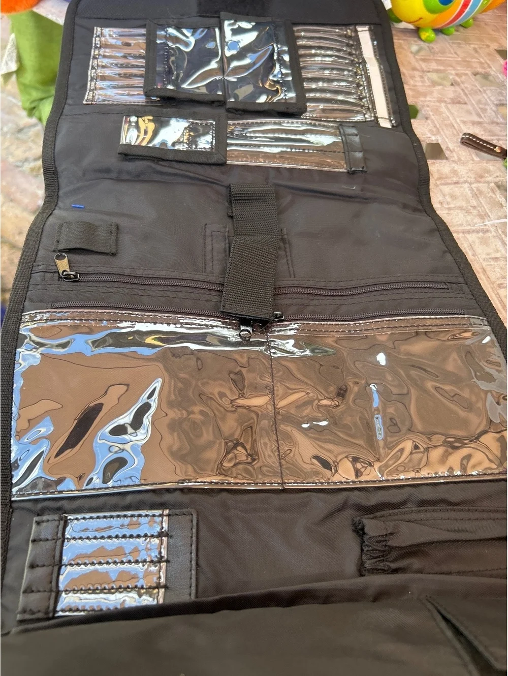 Crop in Style Black Travel Organizer with Multiple Clear Pockets and Buckle